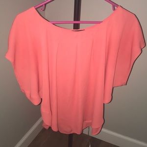 Peachy colored asymmetrical blouse